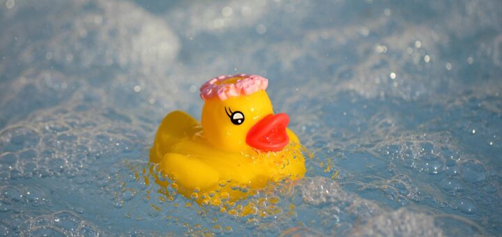 rubber duck, hot tub, swimming pool, bath toy, water, foam, air bubbles, squeaky duck, bath duck, rubber ducks, swim, bathing fun, cute, summer, pool, vacations, vacation, tied
